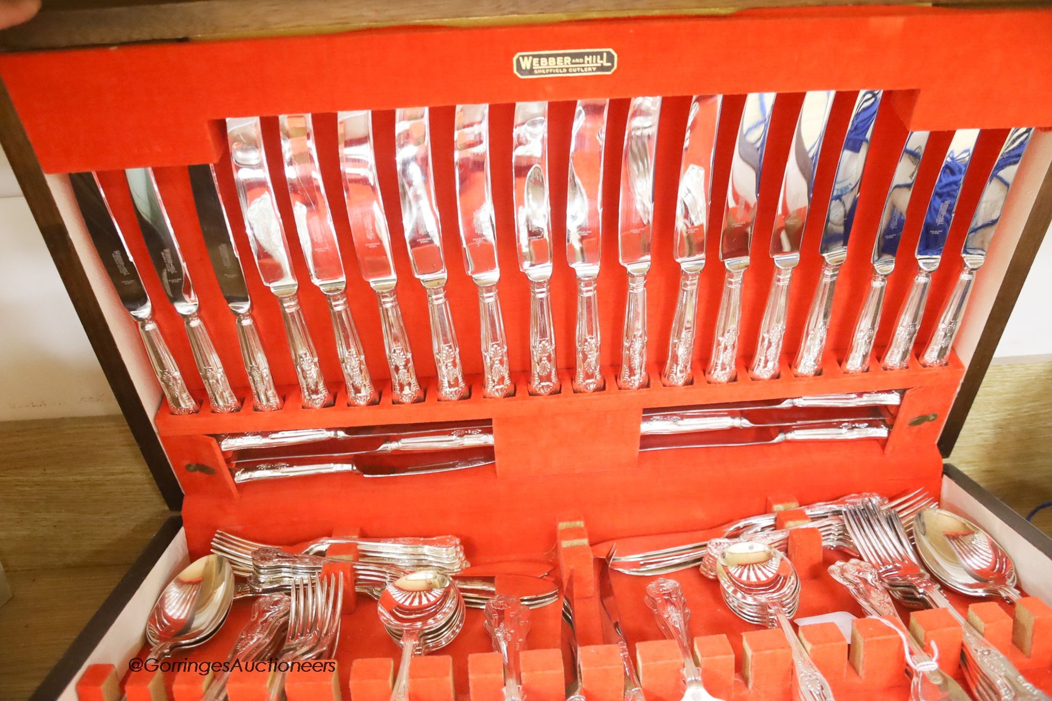 An oak cased Sheffield silver plated canteen of cutlery